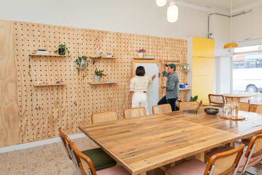 A moment between two coworkers in a coworking place in Australia