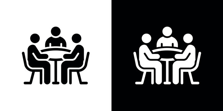 Black and white of people sitting at a table chairs