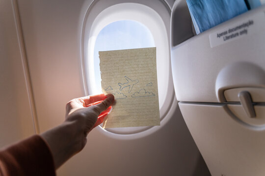Airplane sketch on window