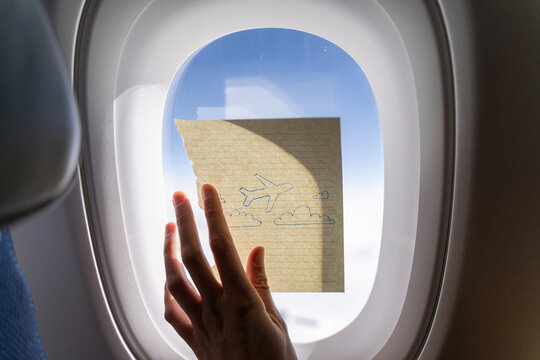 Airplane sketch on window