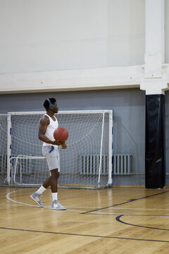 Basketball Player Preparing to Shoot
