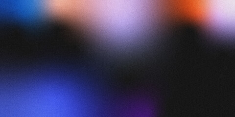 Obraz premium A modern abstract background with a grainy, noisy texture, featuring a smooth gradient of deep blue, purple, warm peach, and burnt orange against a dark base.