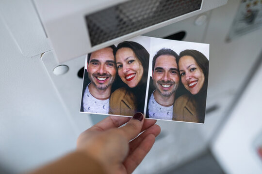 Woman taking photos in photo booth