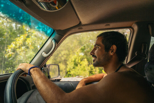 Man driving a car in Fraser Island