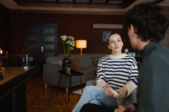 A man and a woman at a psychologist's appointment