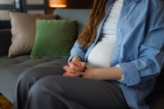 The belly of a pregnant woman