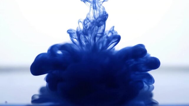 Abstract Fluid Motion Ethereal and organic patterns formed by diffusing ink, with a pristine, uncluttered background.