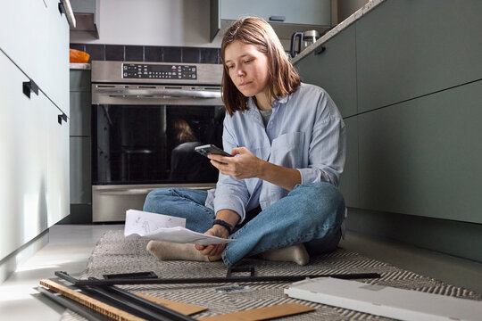 Woman working on setting up furniture