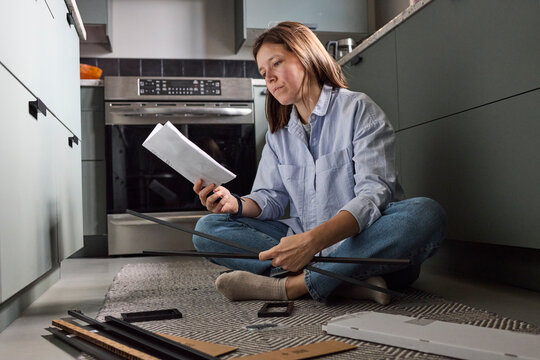Woman working on setting up furniture