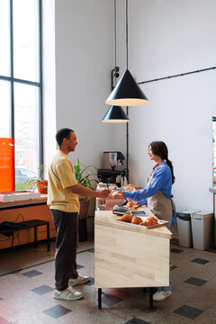 Morning Payment at Coffee Shop Counter