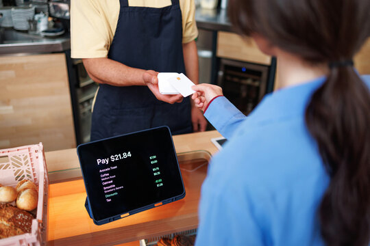 Customer Paying with Card at Cozy Caf&eacute;