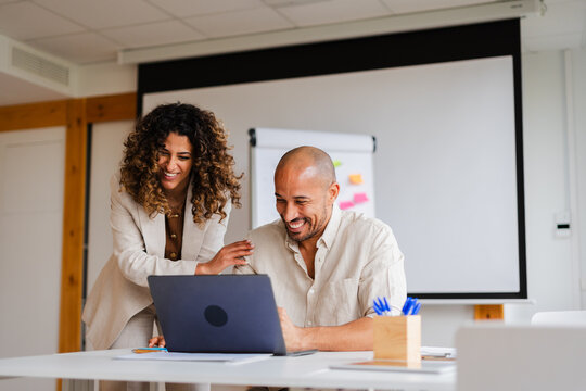 Colleagues have fun working together