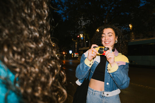 Woman smiling with camera