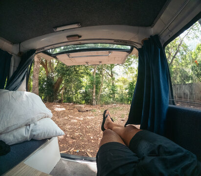 Man chilling in a camper van