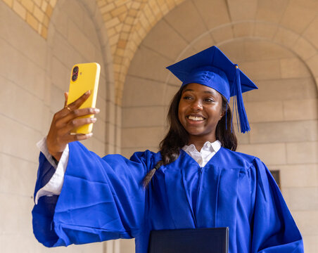 Black Teen school graduate taking cellphone Selfie 