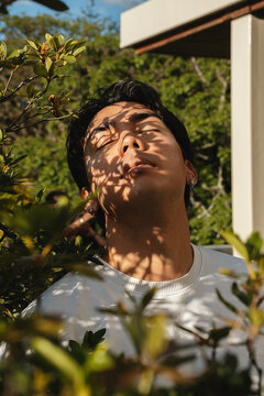Man with Closed Eyes Enjoying Sunset