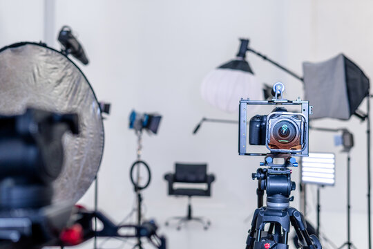 Professional photo shooting setup with camera and lighting equipment