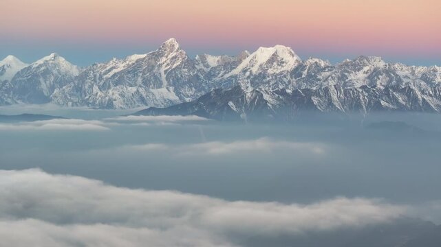 Hengduan mountains snow covered Mount Edgar and Mount Shizi at dawn