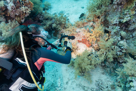 Woman Photographing Underwater