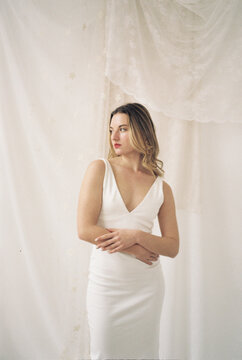 Film photography of  model posing in elegant white dress