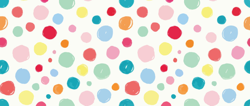 Naive polka dot childish seamless pattern. Hand drawn speckles and colorful spots banner background. Birthday party random circles seamless pattern or wrapping paper. Polka dot backdrop