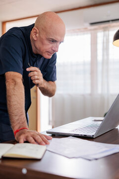 Retired man tired of working on computer
