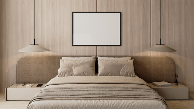 Blank picture frame above bed in modern bedroom interior