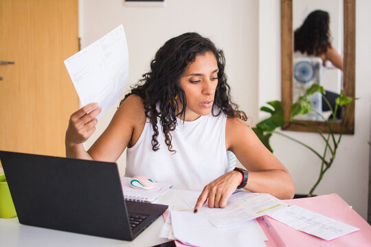 Woman working on loan papers