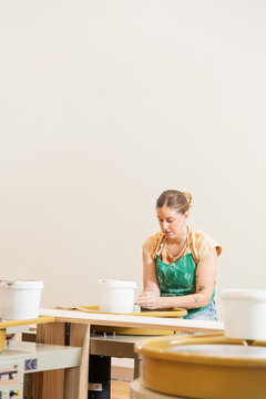 Artisan Pottery Crafting in Bright Studio Space