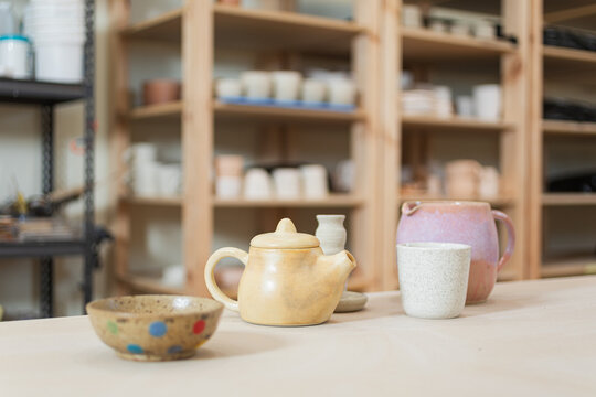 Close-up of freshly made pottery on a table