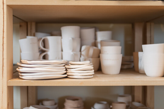 Ceramic Tableware Collection on Wooden Shelf
