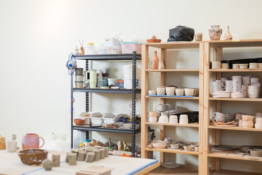 Well-organized pottery studio with various items