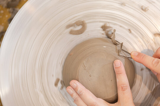 Close-up of Artists Hands Details on Pottery Wheel