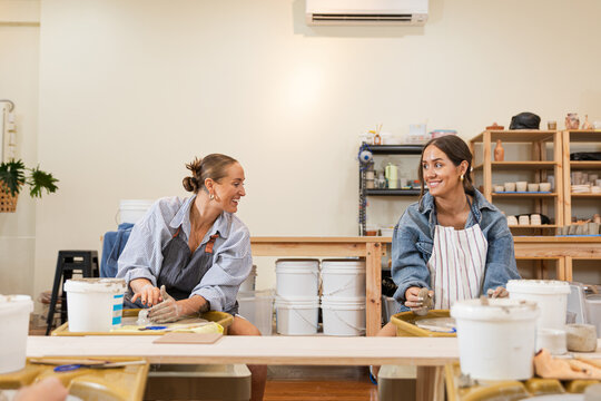 A lesbian couple Enjoying Pottery Class Together