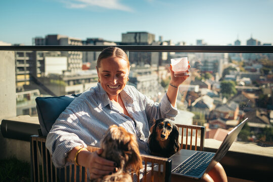 Happy woman with her dog outdoors