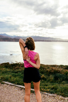 Woman stretching outdoors