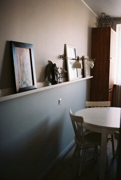 Cozy dining area with artwork and decor
