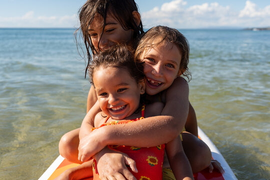 Kids having fun on a paddle board