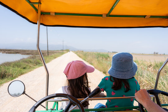 Children Enjoying surrey Bike Ride