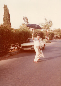 Dancing in the Street with Umbrella

