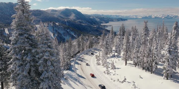 Lake Tahoe - Epic View of Cars on Mt Rose Highway with Lake in Winter after Snowstorm