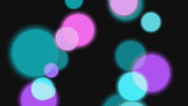 Colorful Bokeh Lights Moving on Black Background.