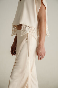 Closeup detail of white satin fabric 
