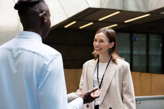 Professional Discussion in Modern Office Hall