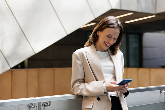Elegant Professional Woman Enjoying Phone Conversation