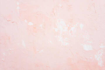 Fototapeta premium Lightpinkpaintedwallwithwhitepatchesandtexturedsurface