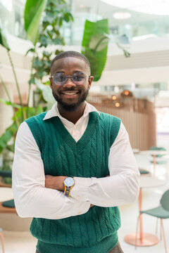 Young Professional In Coworking Lounge