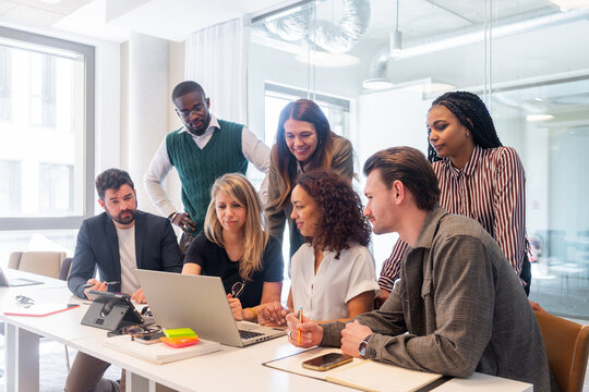 Team Collaboration Around Laptop