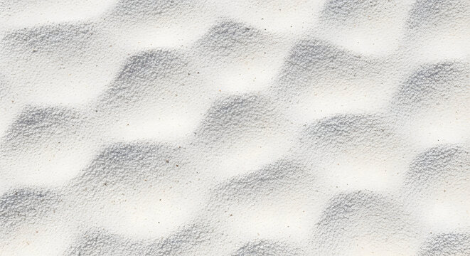 Intricate patterns of sand dunes captured in a close-up black and white photograph