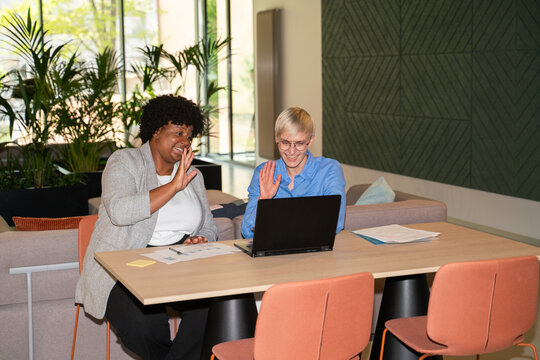 Colleagues Attending Video Call in Modern Office

